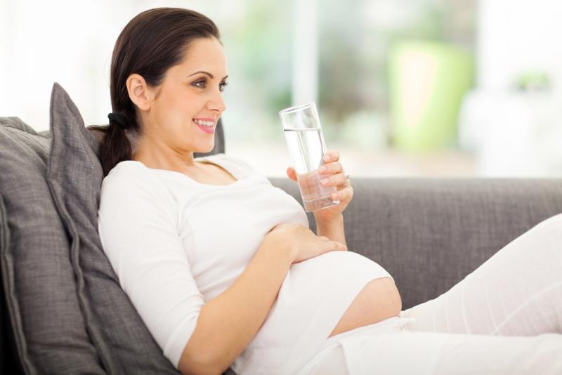 Pregnant lady drinking water
