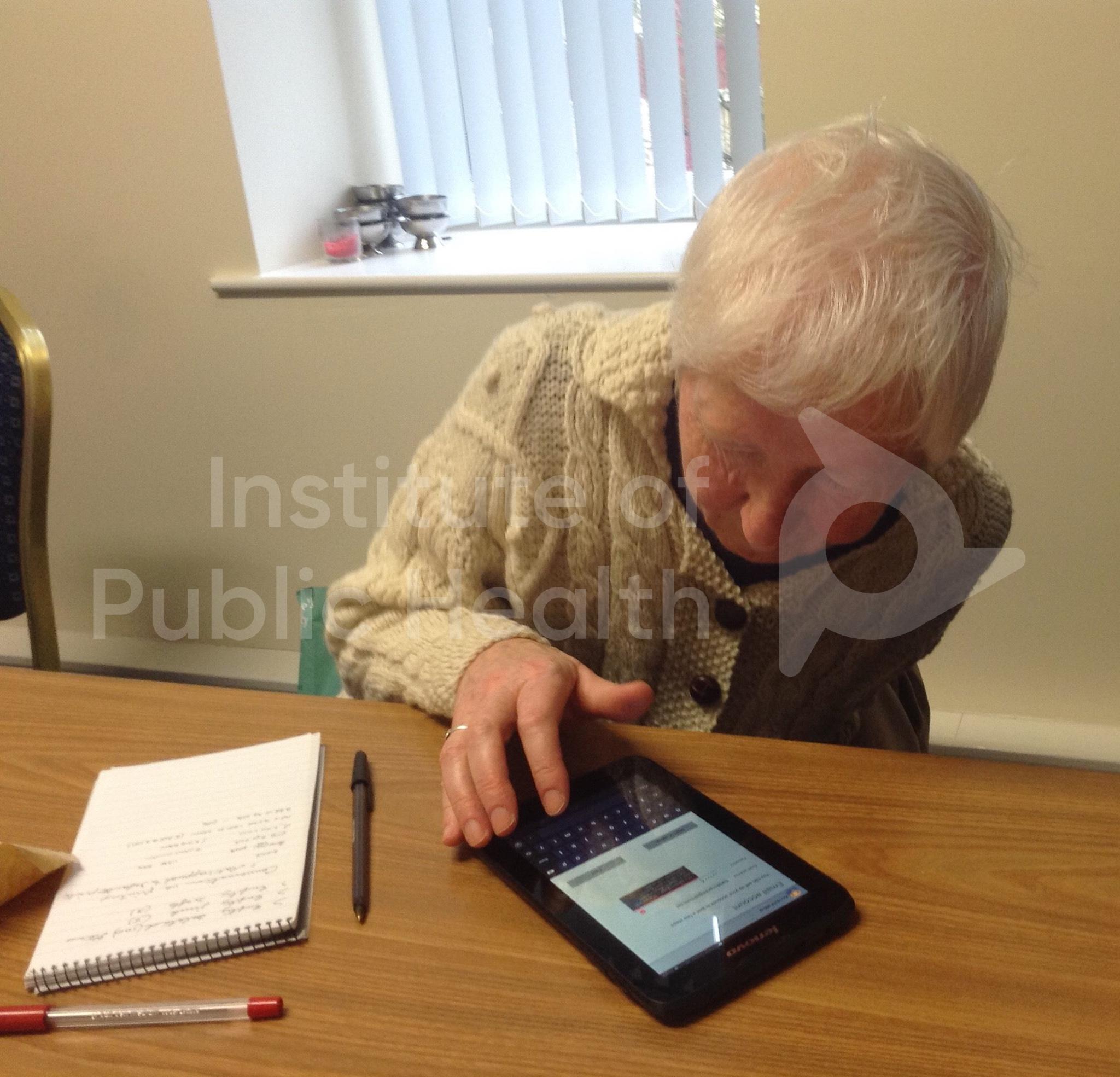 Sister Bridie learning on her tablet